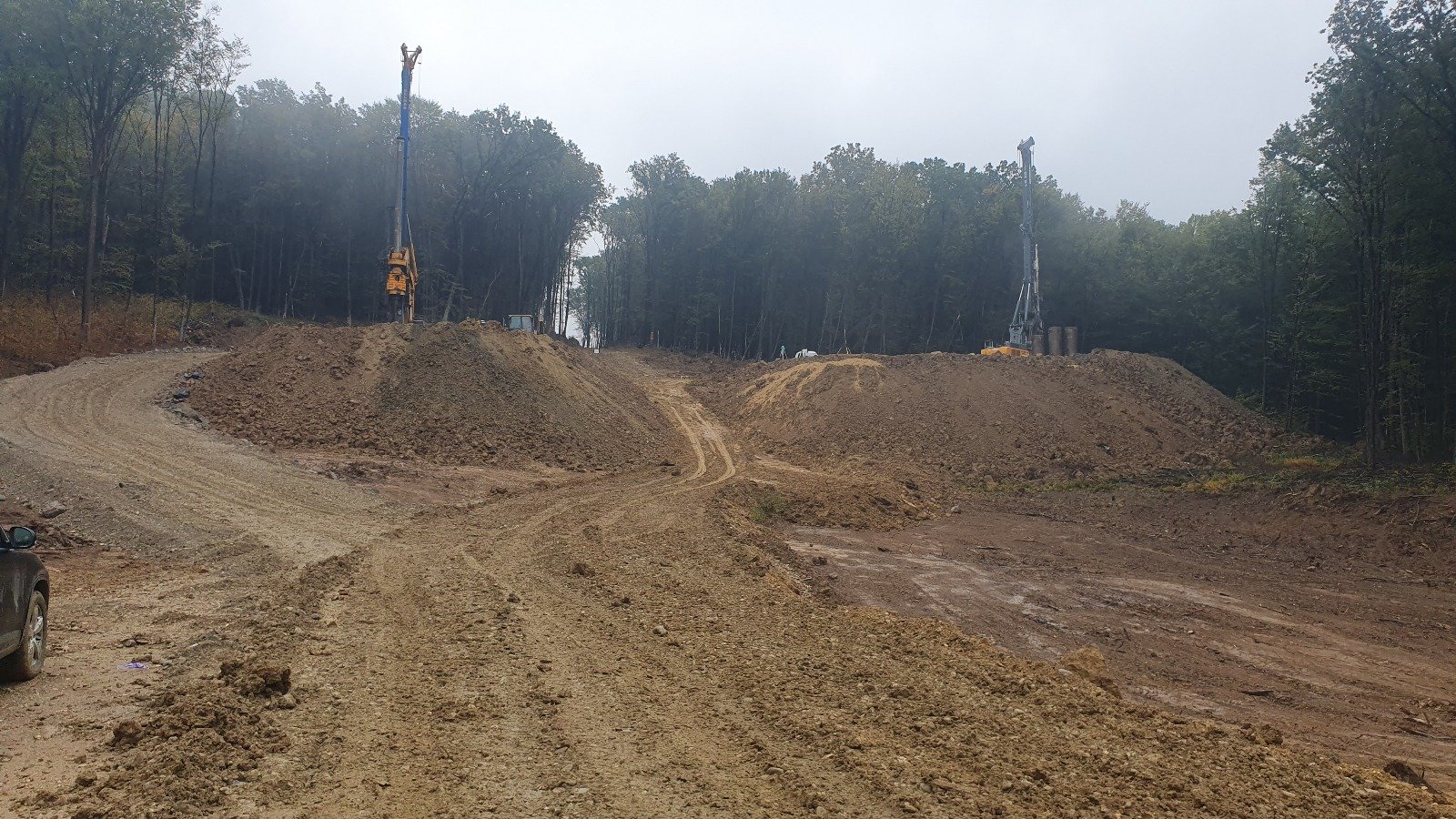 Piling at the portal on the forested hillside